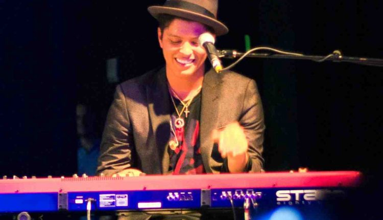 Why did Bruno Mars quit singing?